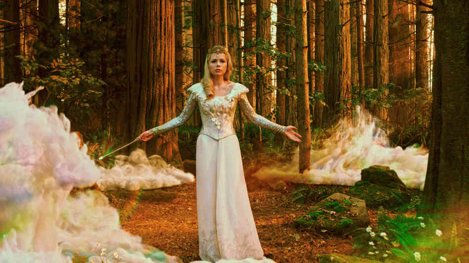 Glinda (Michelle Williams) is a familiar magical presence in this  color-saturated return to L. Frank Baum's famous faraway land.