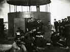 In this undated photograph provided by Naval History and Heritage Command, the crew of USS Monitor relax just outside of its turret.