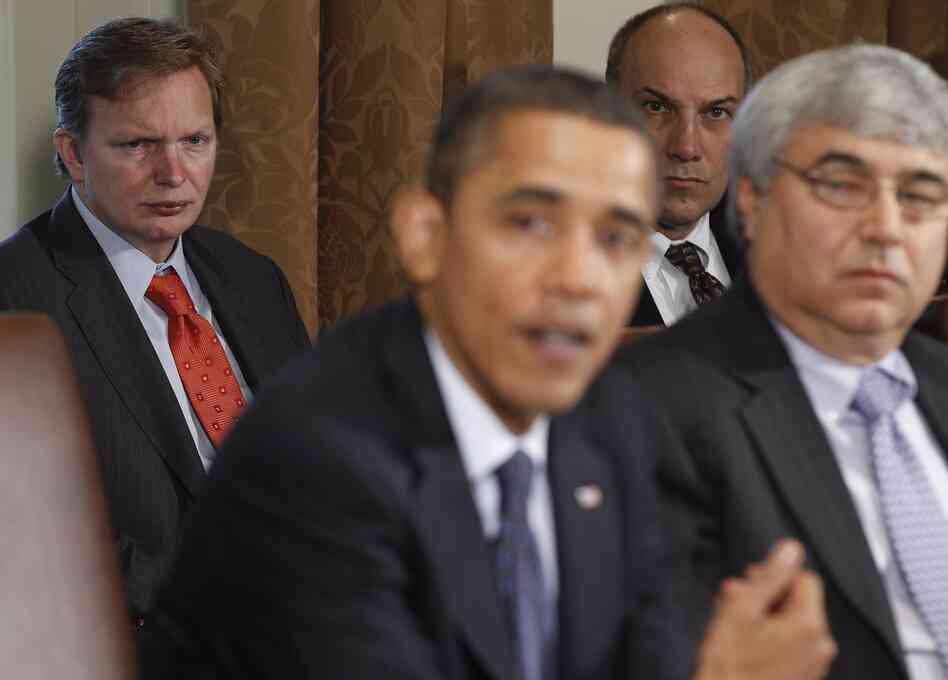 Jim Messina (left), the head of Organizing for Action and a former top Obama campaign and White House aide, watches President Obama make a statement in the White House Cabinet Room in 2010.
