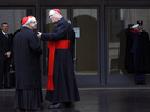U.S. Cardinal Timothy Dolan (right) chats with other cardinals as they arrive for a meeting at the Synod Hall in the Vatican on Thursday. U.S. Cardinal Timothy Dolan (right) chats with other cardinals as they arrive for a meeting at the Synod Hall in the Vatican on Thursday.