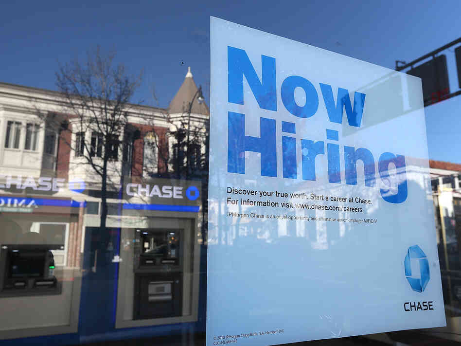 The job market showed strong growth in February. But questions about low wages, consumer debt and government austerity cloud the sunny picture.