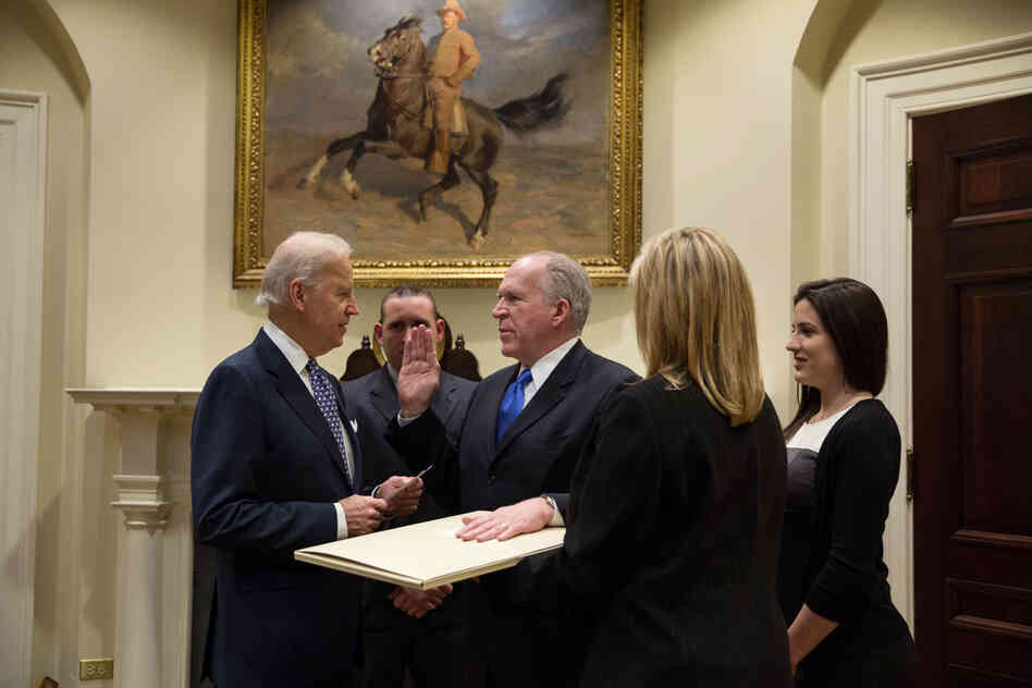 Vice President Joe Biden swears in CIA Director John Brennan in the Roosevelt Room of the White House on March 8, 2013.