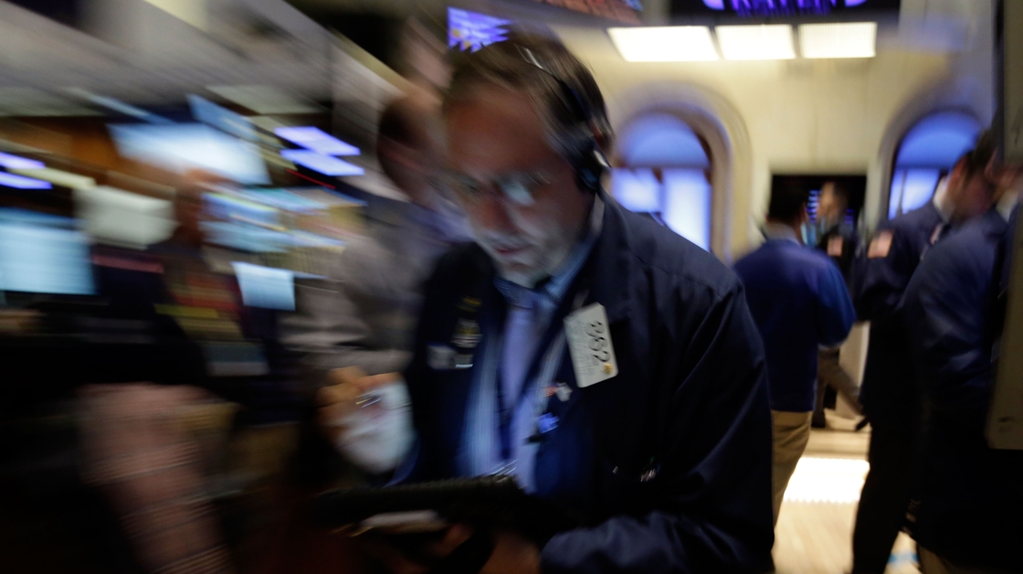 Trader Warren Meyers works on the floor of the New York Stock Exchange on Friday. Stocks opened higher after the government reported a burst of hiring last month that sent the unemployment rate to a four-year low. But both the White House and congressional Republicans reacted to the news in less than celebratory fashion.