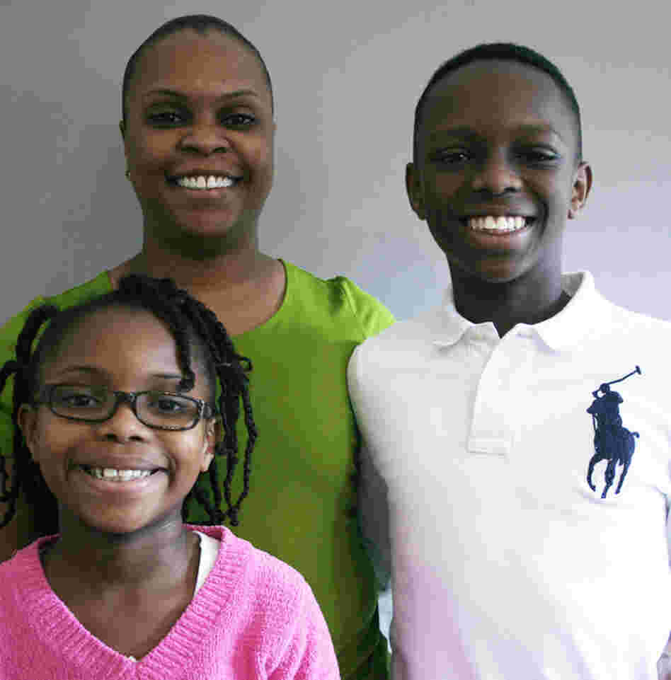 Talana and Willie with their mother, Felicia Banks, who served in Iraq in 2005.
