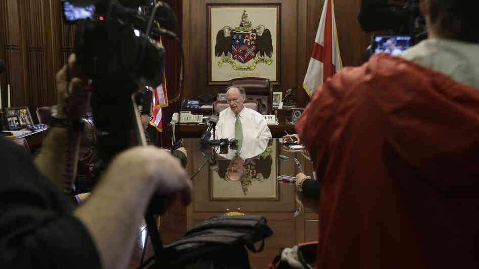 Gov. Robert Bentley talks with reporters in his office, one day after Alabama Republicans adopted legislation to provide state tax credits to attend private schools.