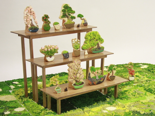 An assortment of Risa Hirai's bonsai cookie art