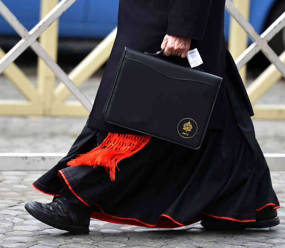 Roman Catholic cardinals have been meeting at the Vatican to get to know each other better and to set a date for the start of the conclave that will choose the next pope. On Thursday, this cardinal was walking to one of those meetings.