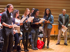 A coach and high school students work on Osvaldo Golijov's Passion According to St. Mark with the composer (right) in November 2012. A coach and high school students work on Osvaldo Golijov's Passion According to St. Mark with the composer (right) in November 2012.