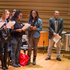 A coach and high school students work on Osvaldo Golijov's Passion According to St. Mark with the composer (right) in November 2012. A coach and high school students work on Osvaldo Golijov's Passion According to St. Mark with the composer (right) in November 2012.