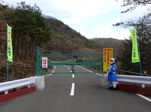 A road leading back to the Togawas' old home in the seaside village of Namie is closed due to radioactive contamination. A road leading back to the Togawas' old home in the seaside village of Namie is closed due to radioactive contamination.