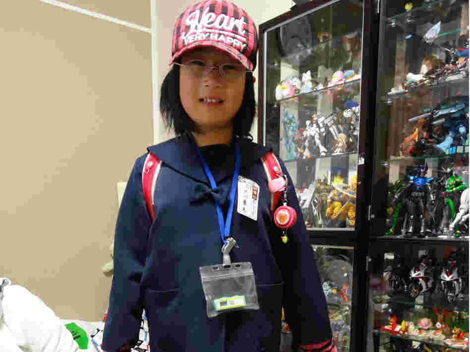 Kae Togawa, 9, must wear a radiation badge whenever she leaves the house.