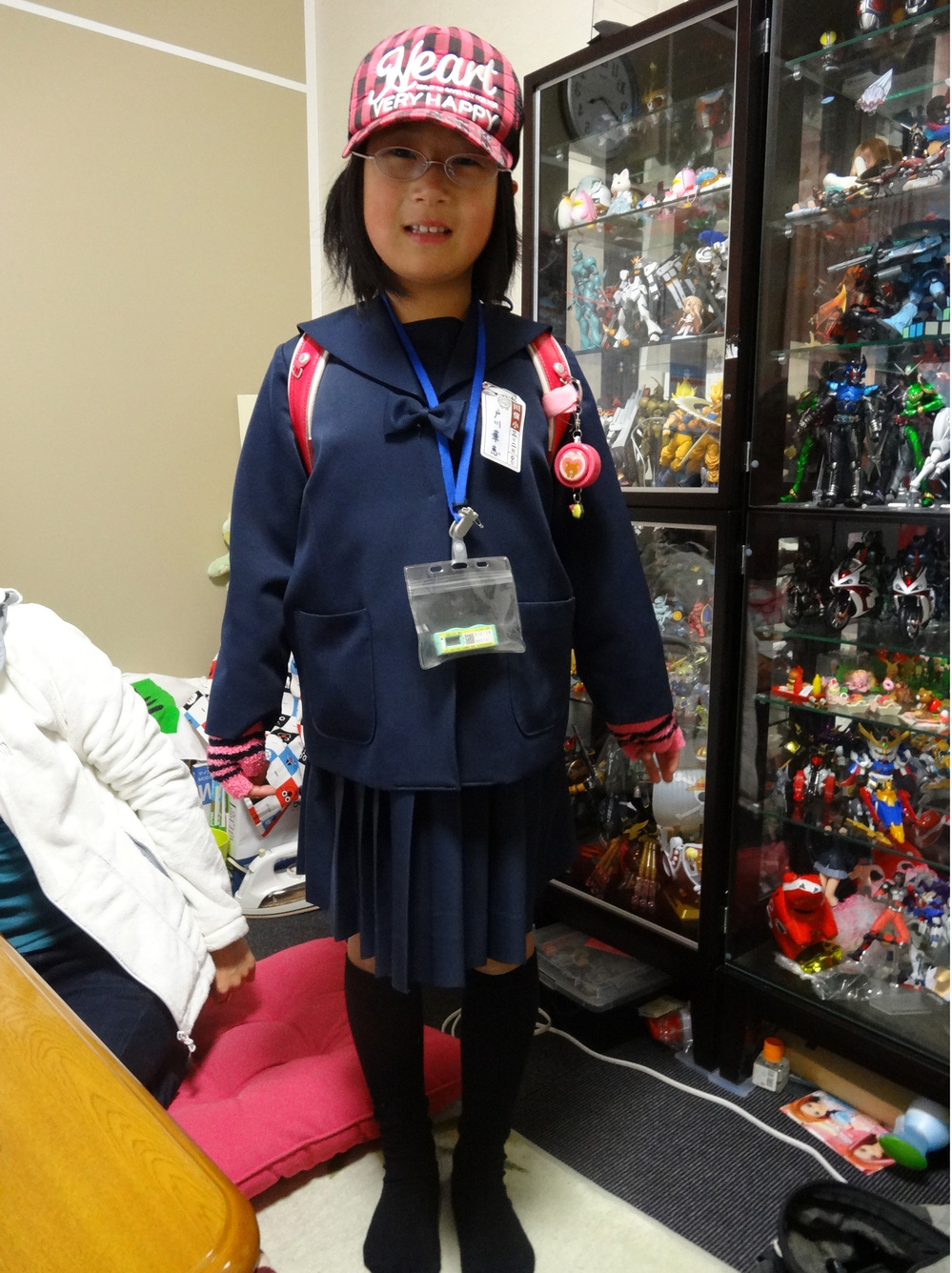 Kae Togawa, 9, must wear a radiation badge whenever she leaves the house.
