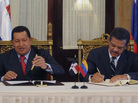 Venezuelan President Hugo Chavez and Leonel Fernandez, the president of the Dominican Republic, sign an agreement in 2010. The Dominican Republic gets about 40,000 barrels of oil a day from Venezuela. Venezuelan President Hugo Chavez and Leonel Fernandez, the president of the Dominican Republic, sign an agreement in 2010. The Dominican Republic gets about 40,000 barrels of oil a day from Venezuela.