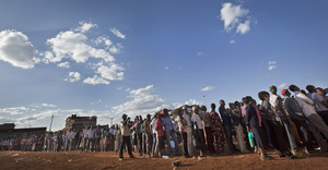 Voters queued for hours across Kenya as old-fashioned paper ballots had to be rushed to polling stations.