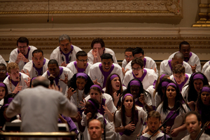 More than 100 choristers from area high schools and the Songs of Solomon choir sang in the Passion, here representing the angry crowd at Jesus' crucifixion.