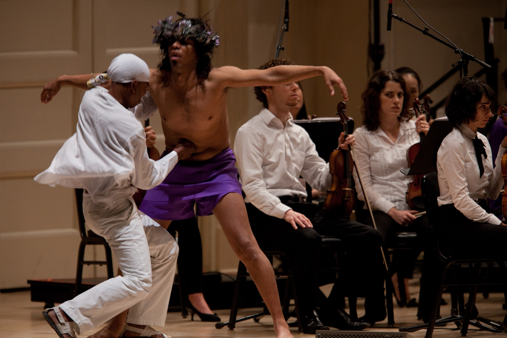 Deraldo Ferreira, left, pierces Jesus, played by Afro-Cuban singer and dancer Reynaldo Gonzalez-Fernandez. 