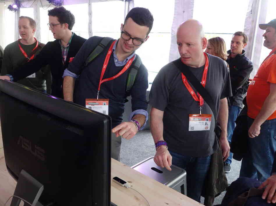 SXSW 2013 festival attendees test out Leap Motion's motion-controlled device, which allows users to interact with computers by gesturing.