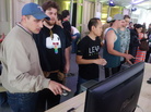 Festival attendees experiment with Leap Motion technology. Festival attendees experiment with Leap Motion technology.