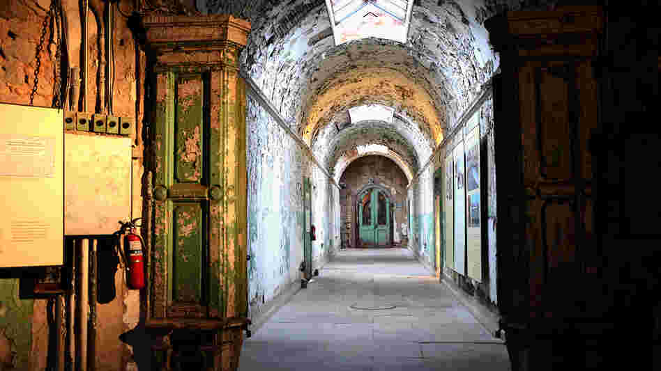 A hallway at Eastern State Penitentiary in Philadelphia. The prison, opened in 1829 and closed in 1970, pioneered the use of solitary confinement.