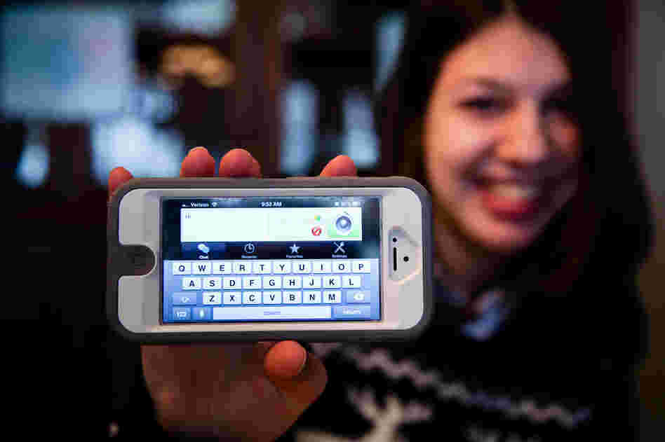 Samantha uses a text-to-speech iPhone app to help her communicate. Here she shows the app interface.