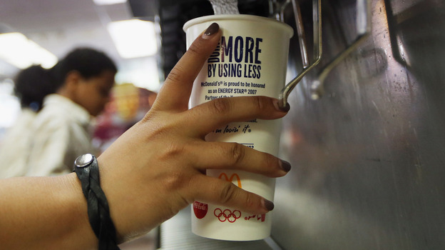 A customer fills a 21-ounce cup with soda at a New York City McDonald's. (Getty Images)