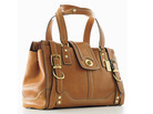 Lillian Cahn was the force behind Coach's leather handbags, which today include this high-end Hamptons Vintage Carryall. Lillian Cahn was the force behind Coach's leather handbags, which today include this high-end Hamptons Vintage Carryall.
