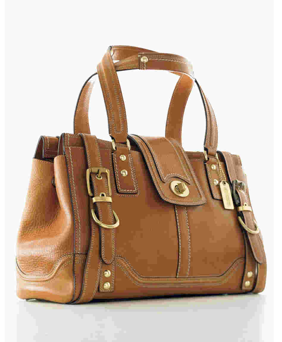 Lillian Cahn was the force behind Coach's leather handbags, which today include this high-end Hamptons Vintage Carryall. Lillian Cahn was the force behind Coach's leather handbags, which today include this high-end Hamptons Vintage Carryall.