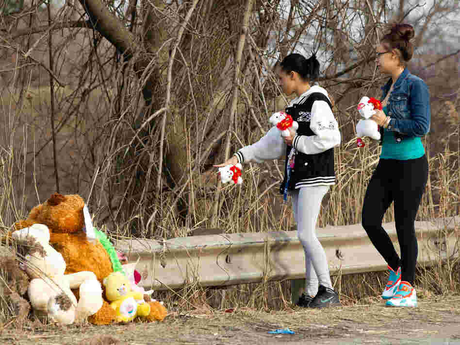 Friends and family of the six teenagers killed in a car crash brought stuffed animals and other memorials to the site Sunday in Warren, Ohio.