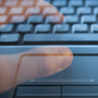 Ghostly fingers on a computer keyboard. Ghostly fingers on a computer keyboard.