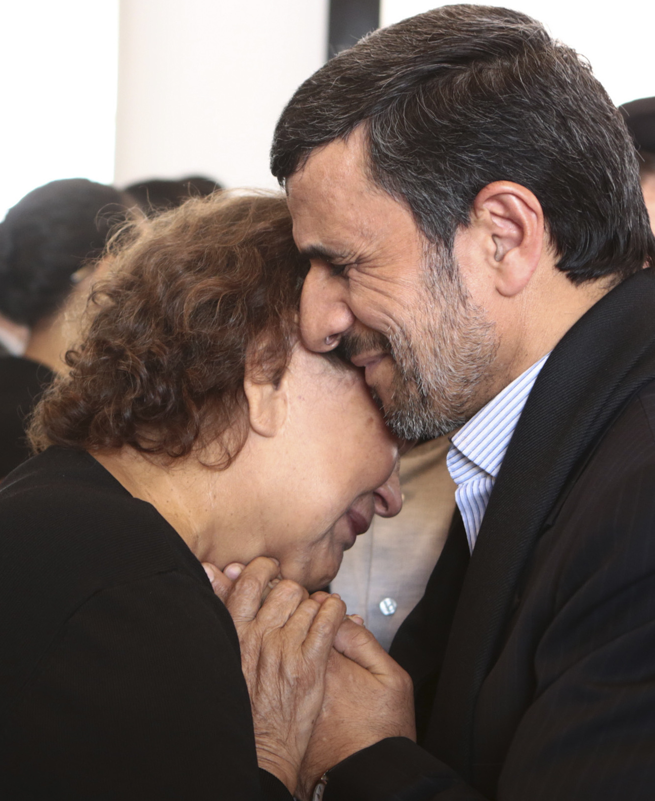 Iran's President Mahmoud Ahmadinejad offered his condolences to Elena Frias, mother of Venezuela's late President Hugo Chávez, last week. This image was provided to news services by the Miraflores Palace — the office of the Venezuelan president.