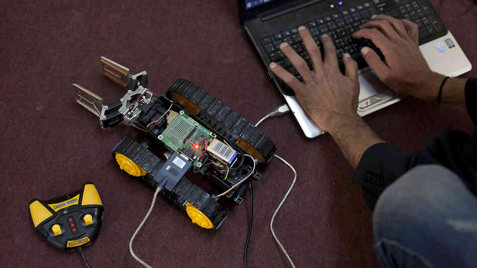 Ahmad "Harvester" Heidar is a computer software engineer whose work for the Syrian rebels includes sweeping the hard drives of detained anti-government activists, and trying to develop a robot that will help extract sniper victims in Syria. Turkish officials have given Heidar the green light to develop a prototype of his robot, which he calls Tina. Ahmad "Harvester" Heidar is a computer software engineer whose work for the Syrian rebels includes sweeping the hard drives of detained anti-government activists, and trying to develop a robot that will help extract sniper victims in Syria. Turkish officials have given Heidar the green light to develop a prototype of his robot, which he calls Tina.