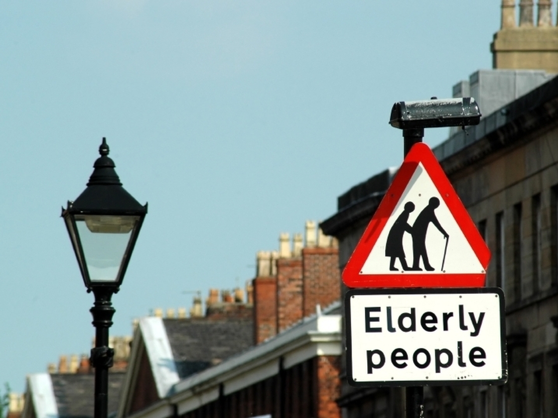 A traffic sign in the U.K. depicts "elderly people" as frail and hunched over. It was first created in the 80s, but many now consider it out of date.