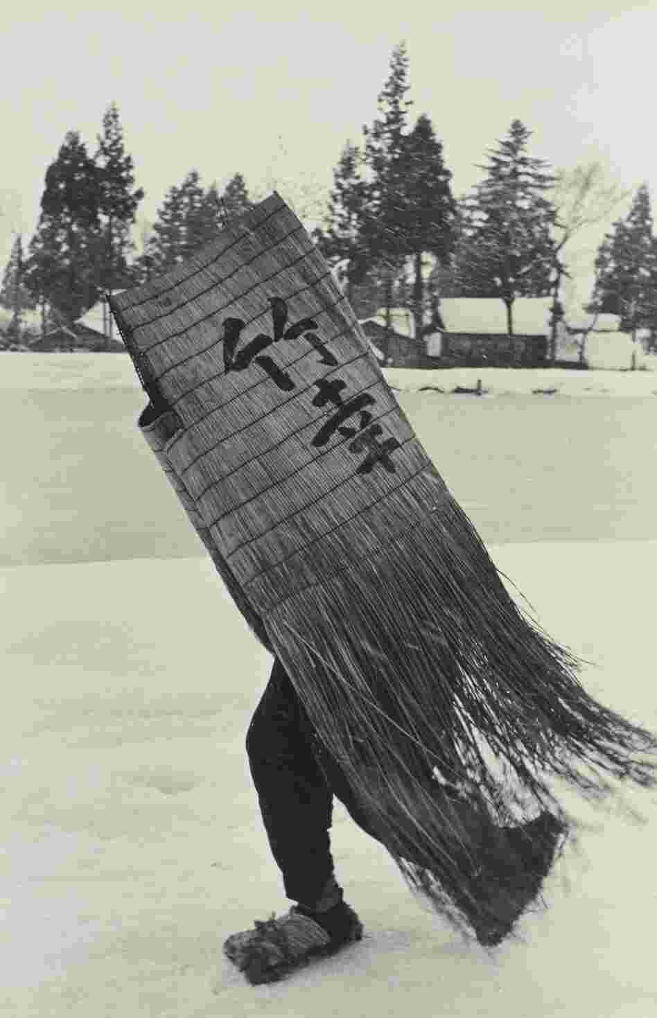 Man in a Traditional Minobashi Raincoat, Niigata Prefecture, 1956
