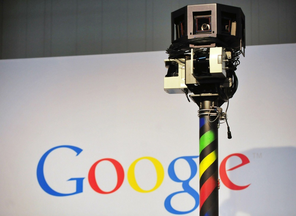 The camera mounted on a Google Street View car used to photograph whole streets obscures part of the U.S. Internet giant's logo.