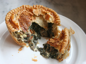 Mushroom And Kale Pie, shown here as a single-serving pie at Pleasant House Bakery.