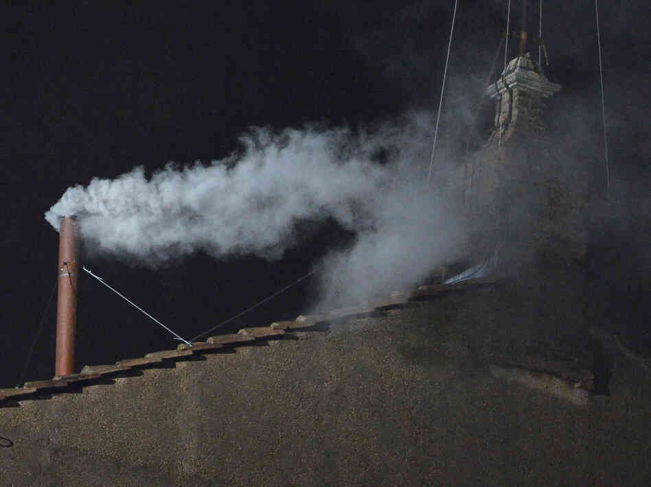 White smoke rises from the chimney on the roof of the Sistine Chapel meaning that cardinals elected a new pope on Wednesday, the second day of their secret conclave on at the Vatican.
