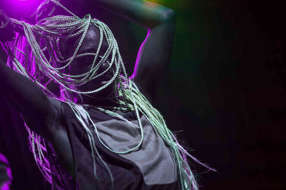 At the start of his set, Rapper Le1f's blond braids were in a bun, but they soon swung free.