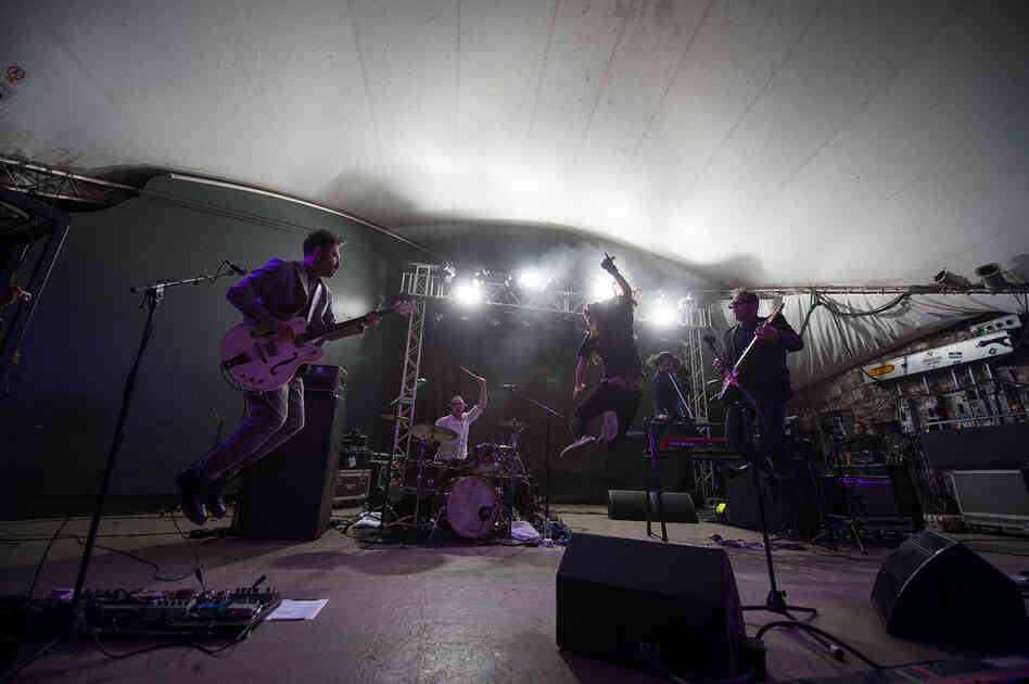 Ruben Albarran, the singer for Cafe Tacvba, leads the band through one of its rhythm-heavy, disco- and rock-inspired songs.