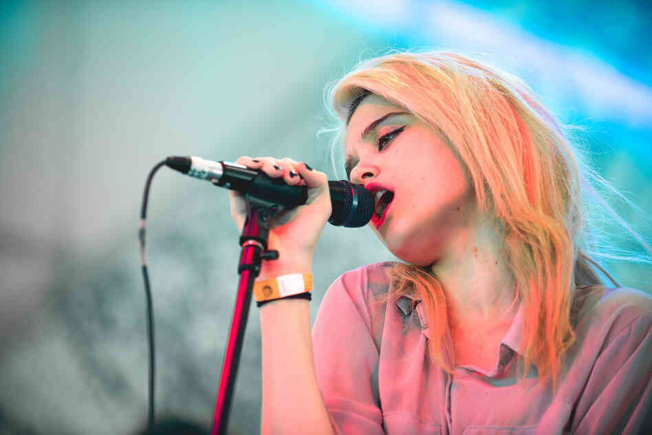 Arrayed in pink and blue hues, Sky Ferreira was a vision of neon electro-pop at The Fader Fort.