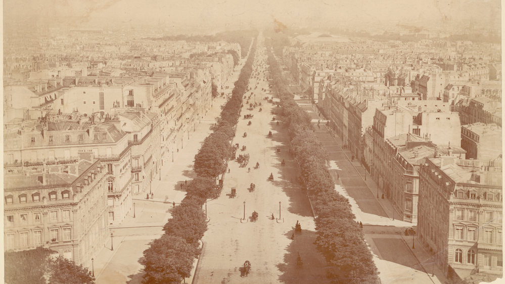 A view down the Champs Elysees, from the top of the Arc de Triomphe, circa 1860.