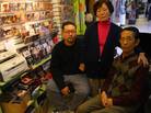 Wan Joon Kim (right), with his son Kirk and wife, Boo Ja, at their stall inside the Compton Swap Meet last January. Wan Joon Kim (right), with his son Kirk and wife, Boo Ja, at their stall inside the Compton Swap Meet last January.