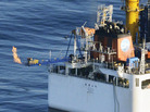 This photo from a Kyodo News helicopter shows a flame of natural gas from a Japanese deep-sea drilling ship on Tuesday. This successful extraction of methane from the seafloor was a world first. This photo from a Kyodo News helicopter shows a flame of natural gas from a Japanese deep-sea drilling ship on Tuesday. This successful extraction of methane from the seafloor was a world first.