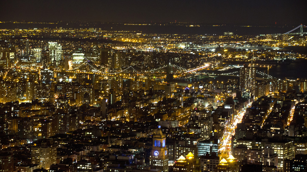 For the first time in six decades, New York City has added more residents than it lost, according to the most recent Census data. Here, lower Manhattan and Brooklyn are seen in a photo taken in February.