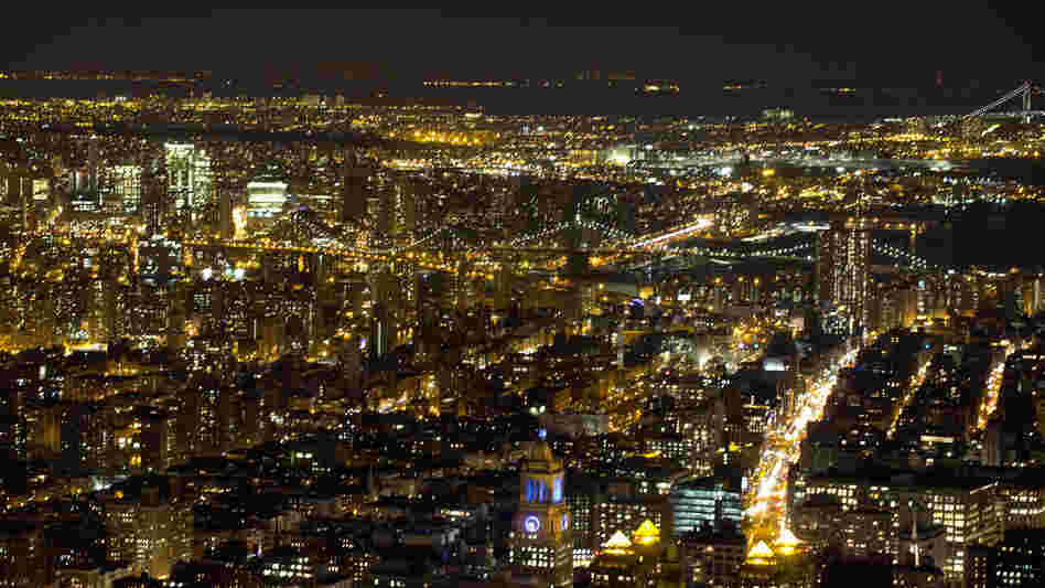 For the first time in six decades, New York City has added more residents than it lost, according to the most recent Census data. Here, lower Manhattan and Brooklyn are seen in a photo taken in February.