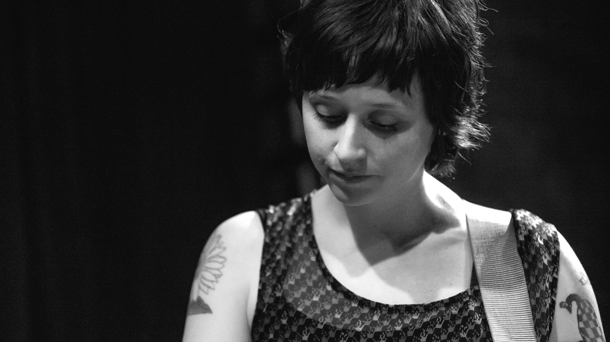 Waxahatchee's Katie Crutchfield began her set at the indoor stage at Stubb's by strumming three songs alone on an electric guitar, before being joined by two band mates.