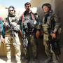 Sgt. Jaclyn O'Shea (second from left) and Sgt. Alyssa Corcoran (right) stand with Afghan commandos in Logar province, Afghanistan.