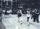 Mississippi State's Stan Brinker (53) and Loyola's Jerry Harkness (15) shake hands before the NCAA Mideast regional semifinal college basketball game in East Lansing, Mich., on March 15, 1963. The game was a landmark contest between the schools that helped alter race relations on the basketball court. Mississippi State's Stan Brinker (53) and Loyola's Jerry Harkness (15) shake hands before the NCAA Mideast regional semifinal college basketball game in East Lansing, Mich., on March 15, 1963. The game was a landmark contest between the schools that helped alter race relations on the basketball court.