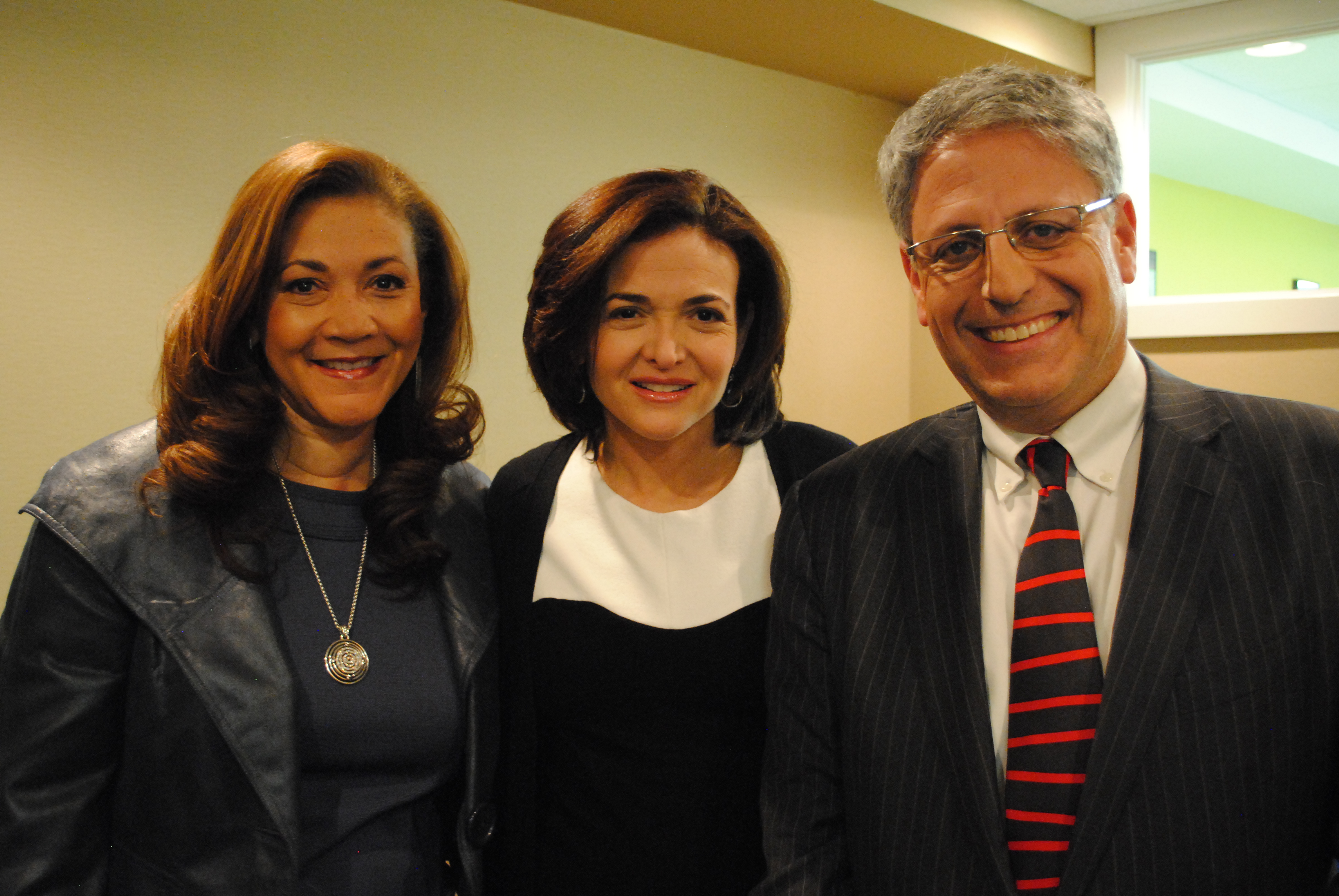 NPR President and CEO Gary E. Knell stands with the honored guests of the night, (l-r) NPR Host and Special Correspondent Michele Norris and Facebook COO and author Sheryl Sandberg.