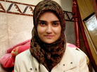 Guffran, 16, sits on the floor of her home, holding a letter she wrote to her father. A Shiite Muslim, Guffran's father was gunned down on the streets of Baghdad in 2006. Guffran, 16, sits on the floor of her home, holding a letter she wrote to her father. A Shiite Muslim, Guffran's father was gunned down on the streets of Baghdad in 2006.