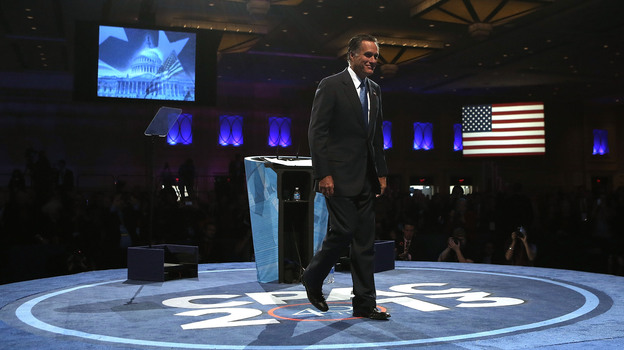 Former Republican presidential candidate Mitt Romney leaves the stage after speaking Friday at the Conservative Political Action Conference in Maryland's National Harbor.